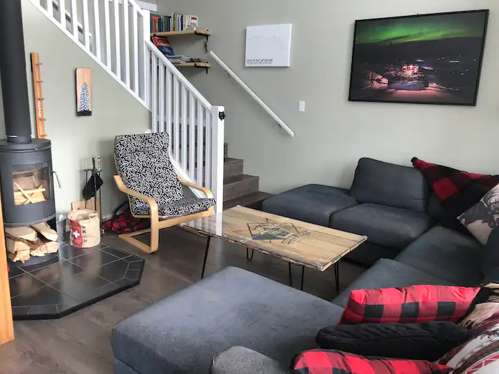 Living room with wood-burning fireplace at Bonnie Doon