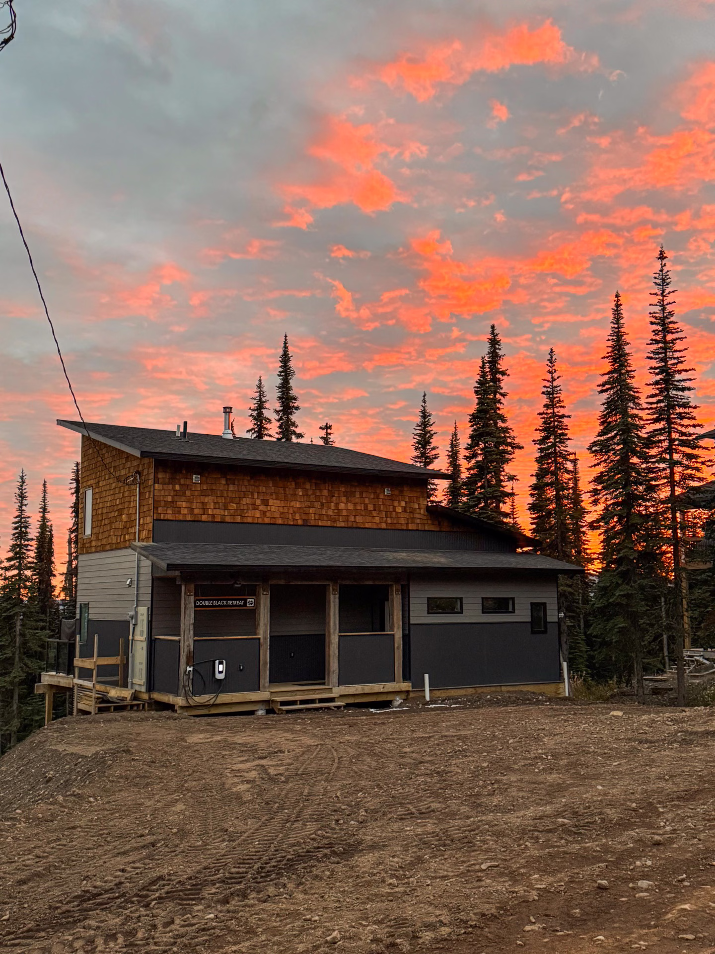 Double Black Retreat cabin in the green summer season, Hudson Bay Mountain