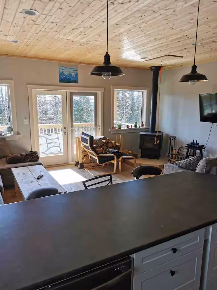 Open-plan living room at Sunrise Chalet